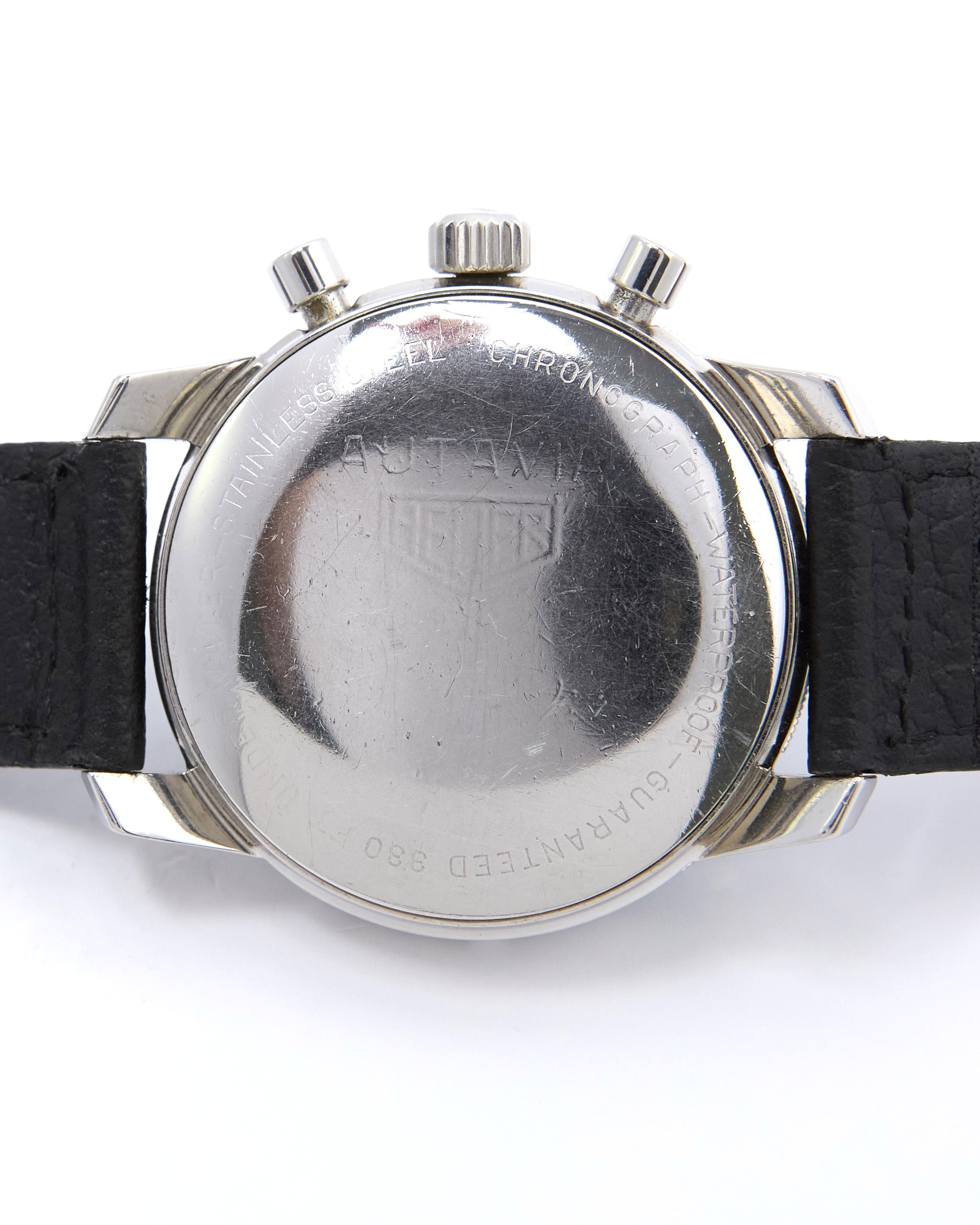 Heuer Autavia Chronograph 7763 Faded Black Bezel in Steel Case on Leather Strap with Heuer Buckle