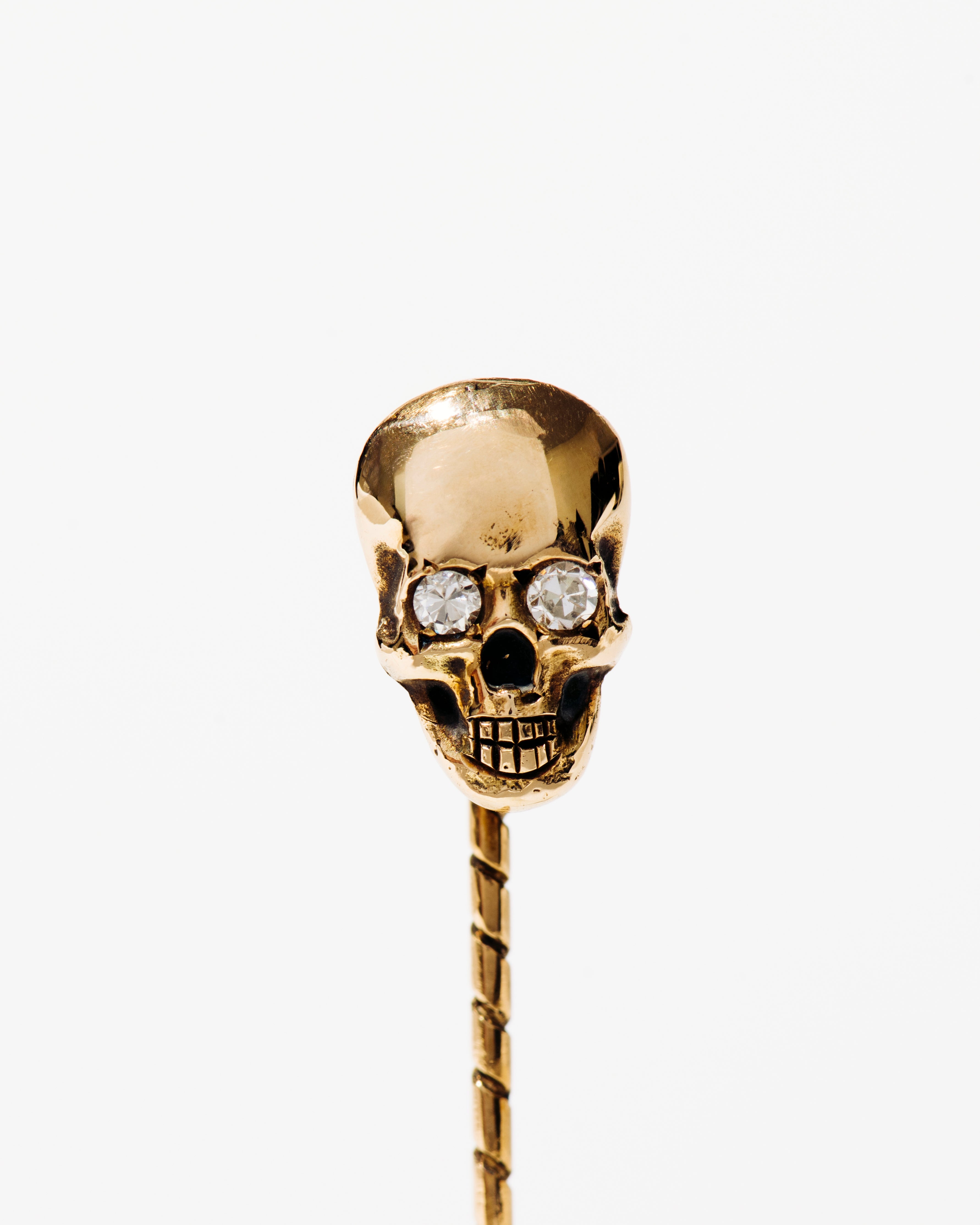 Gold Skull Stick Pin with Diamond Eyes
