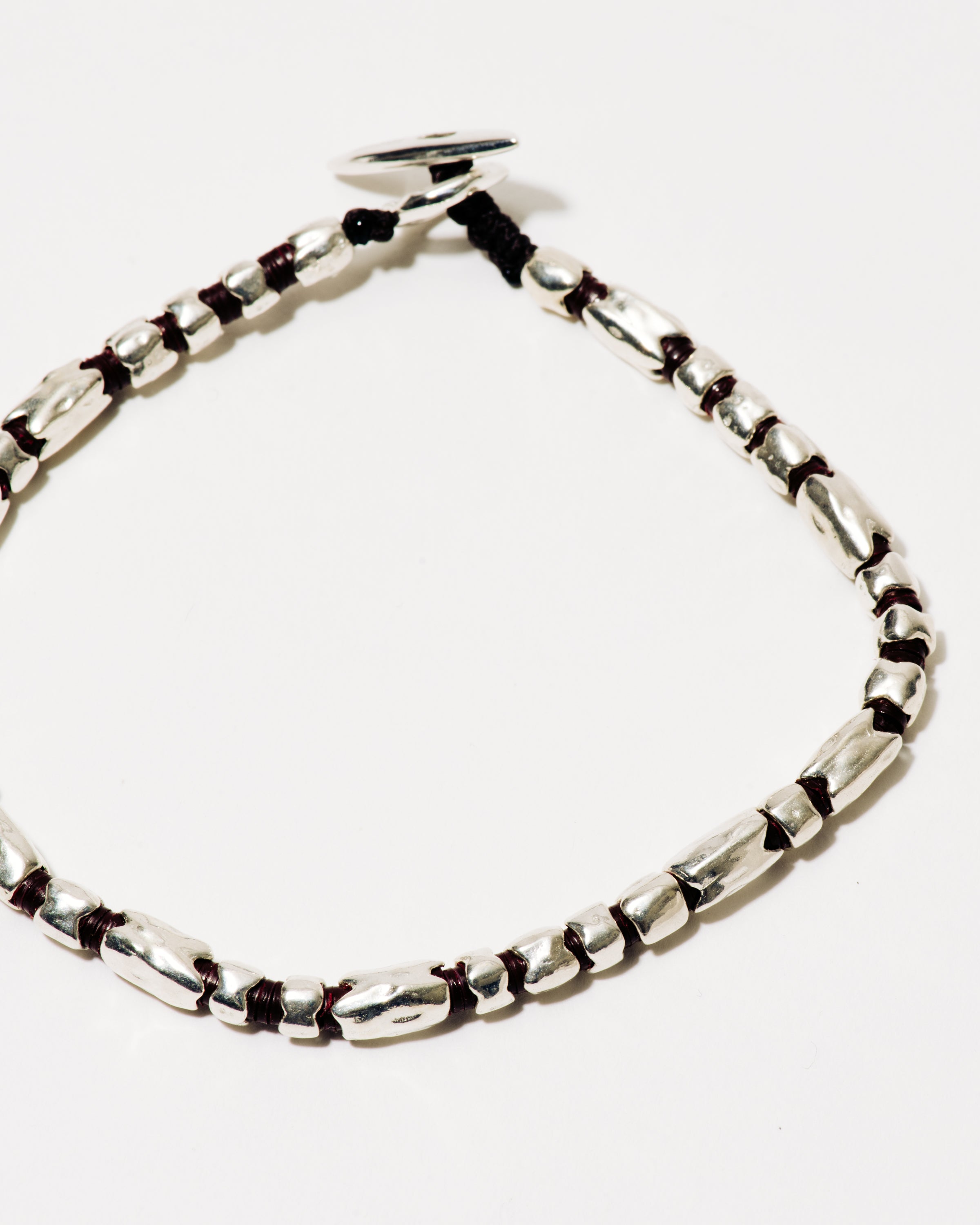 Dryp-2 Bracelet in Silver with Brown African Discs