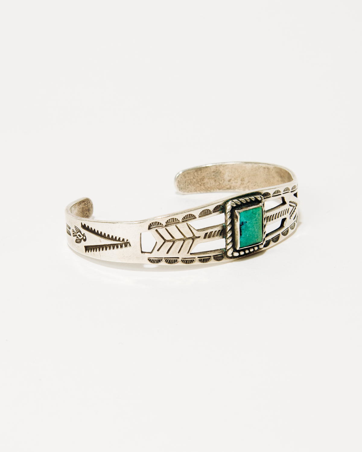 Navajo Stamped Silver Bracelet with Arrow and Turquoise Cabochon, c. 1940