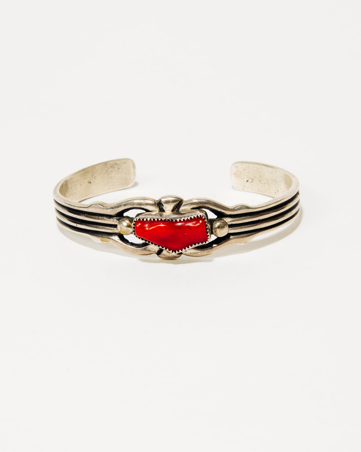 Carolyn and Wilson Begay Navajo Silver Bracelet with Coral Cabochon
